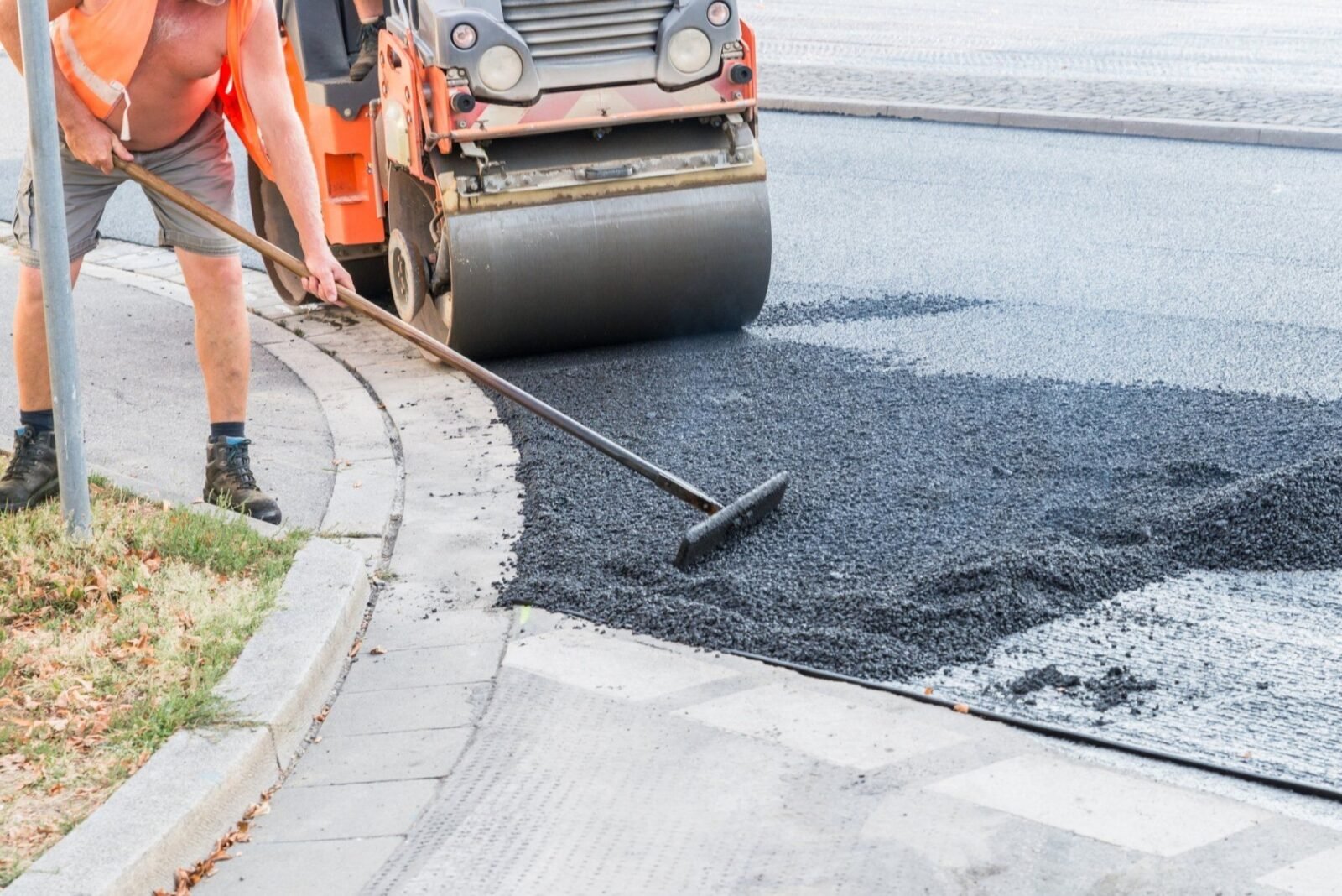 Palm Beach Asphalt contractors patching the cracks in this HOA road in Delray Beach, FL