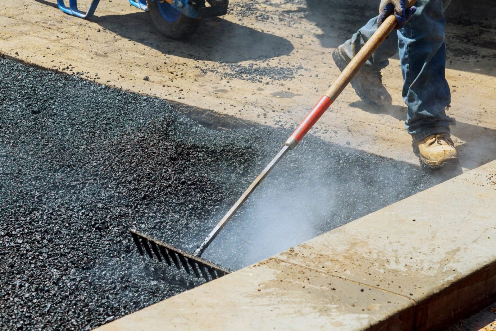 Crack sealing is being performed in a parking lot in WPB to prevent major repairs.