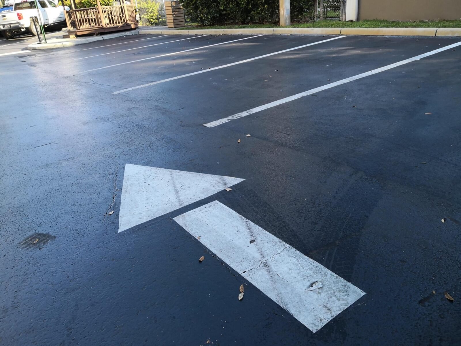 sealcoated parking lot in Boynton Beach FL with line striping