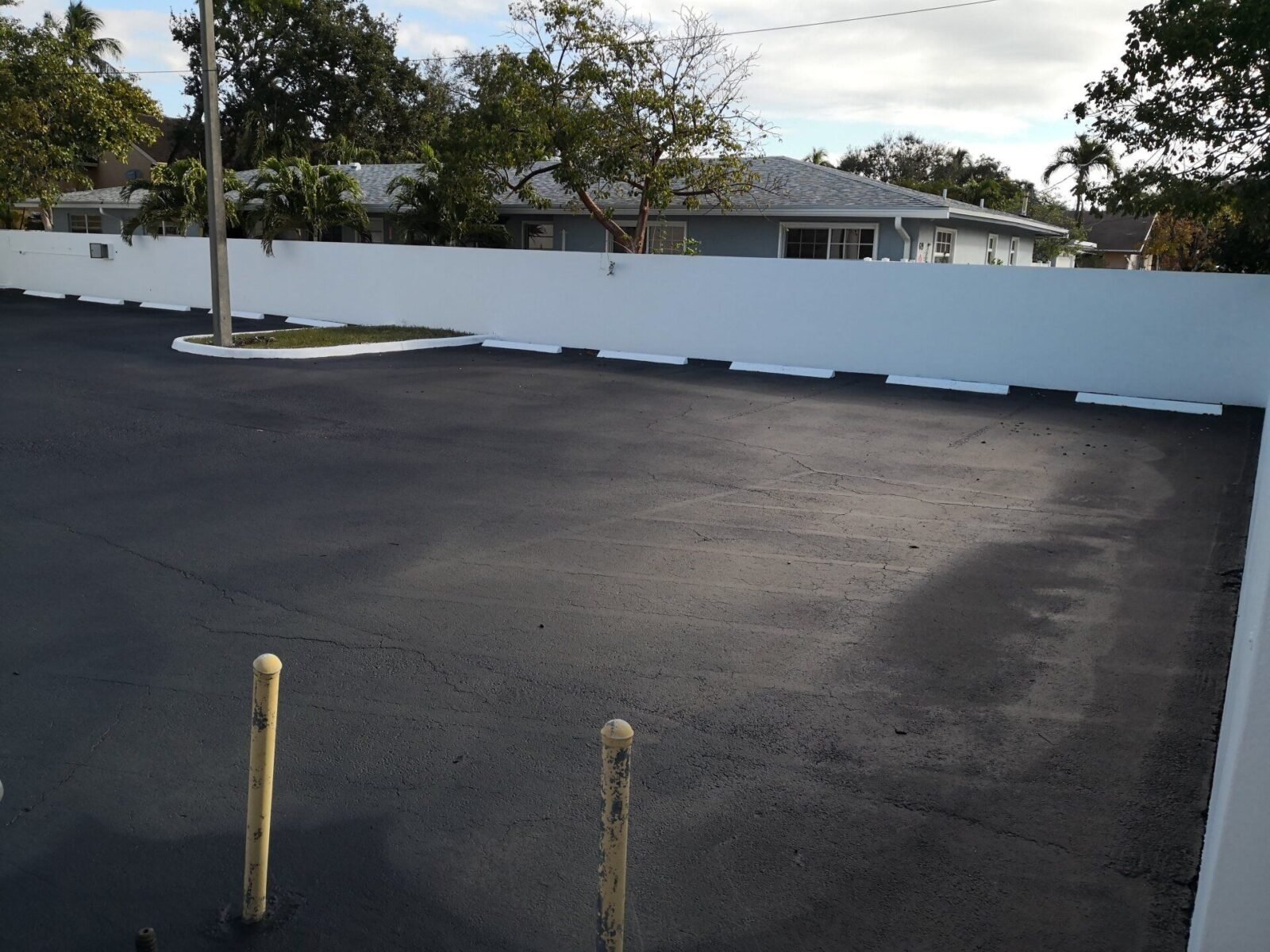 asphalt parking lot sealcoating in Riviera Beach FL done by Palm Beach Asphalt experts