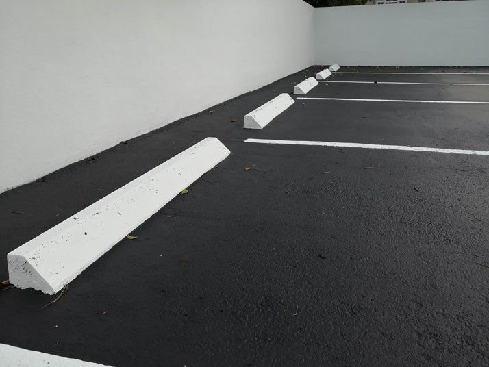 this shining parking lot in Delray Beach is sealcoated by Palm Beach Asphalt